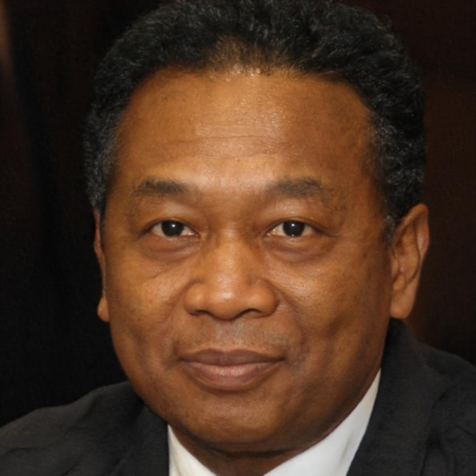 Bjorn Lindqvist reviewing financial documents at his desk