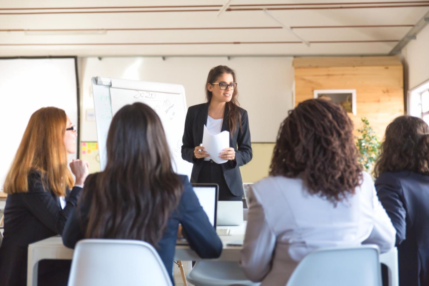 Business professionals reviewing financial ratio analysis